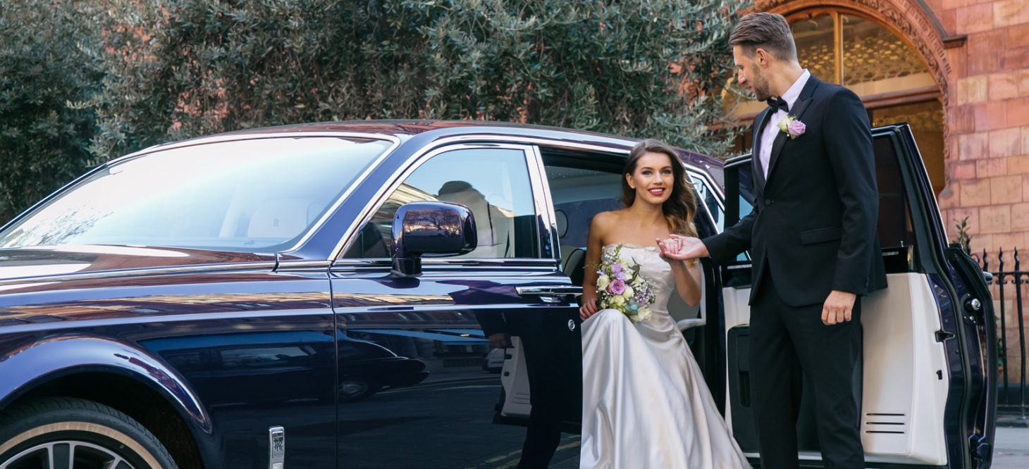 Bride and groom car departure